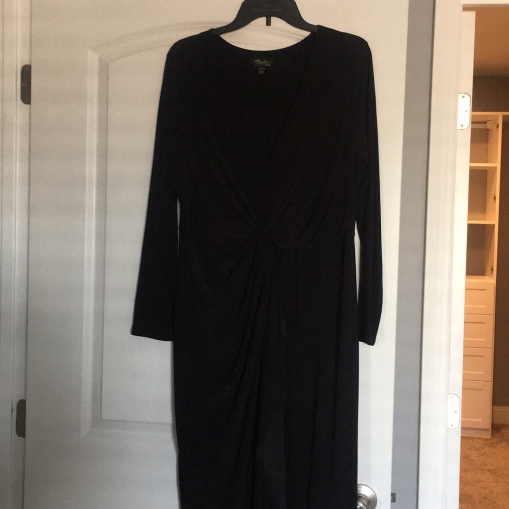 Longsleeve formal dress with front slit. V neck.